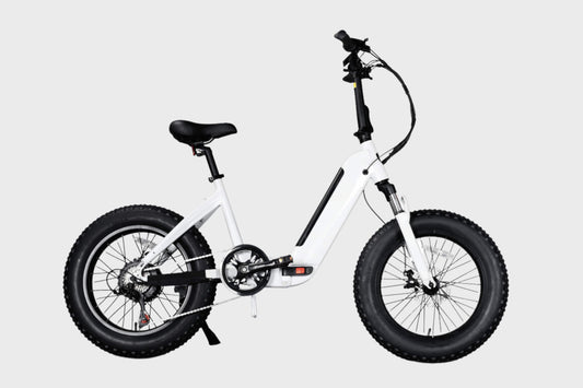 White aluminum folding fat tire e-bike by DAMAXED.
