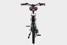 White DAMAXED electric city bike with brown leather saddle, 9-speed, Ananda M100 motor, LG 48V14Ah battery.  Back view showing rear rack and fenders.